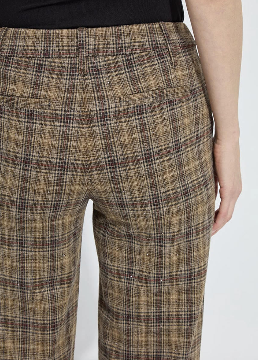 Plaid pants worn by a person on a white background