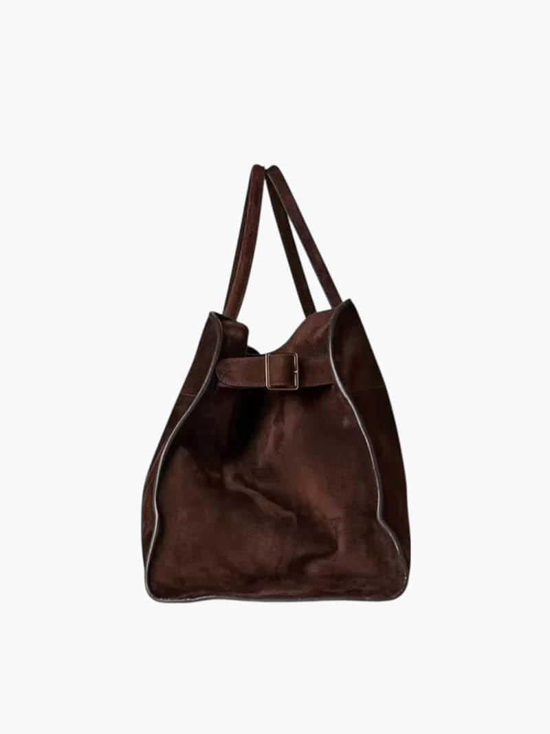 Brown leather tote bag on a white background