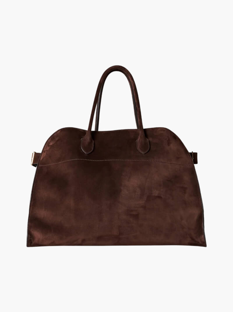 Brown leather handbag on a white background