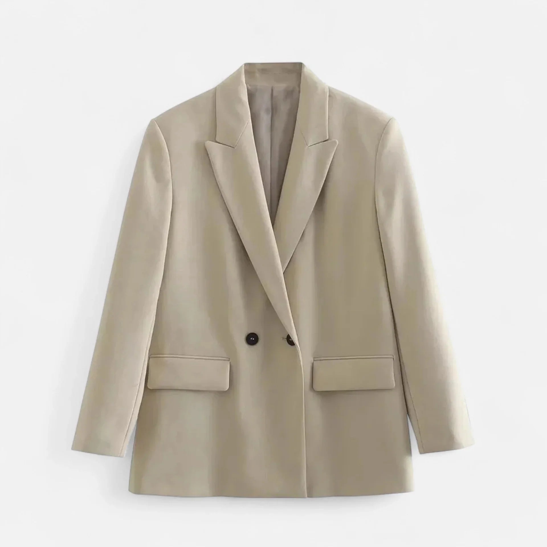 Beige blazer on a light gray background