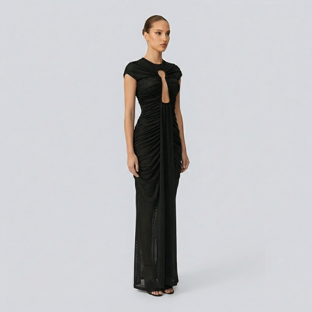 Black evening gown with cut-out design on a white background